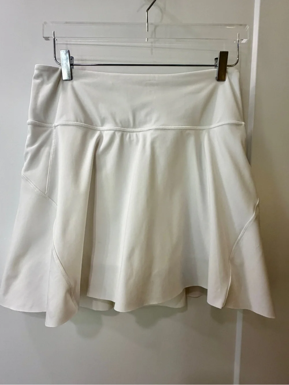Athleta White Mini Skirt with Slight Flare, pockets on each side.